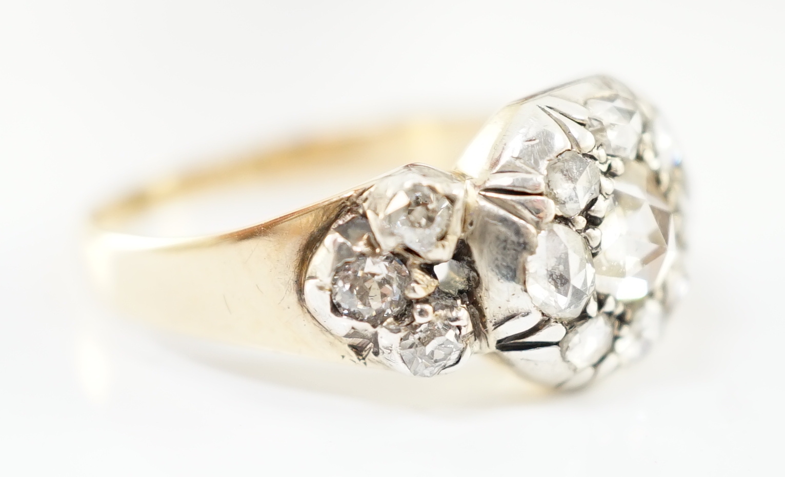 A Georgian gold, silver and rose cut diamond cluster set dress ring